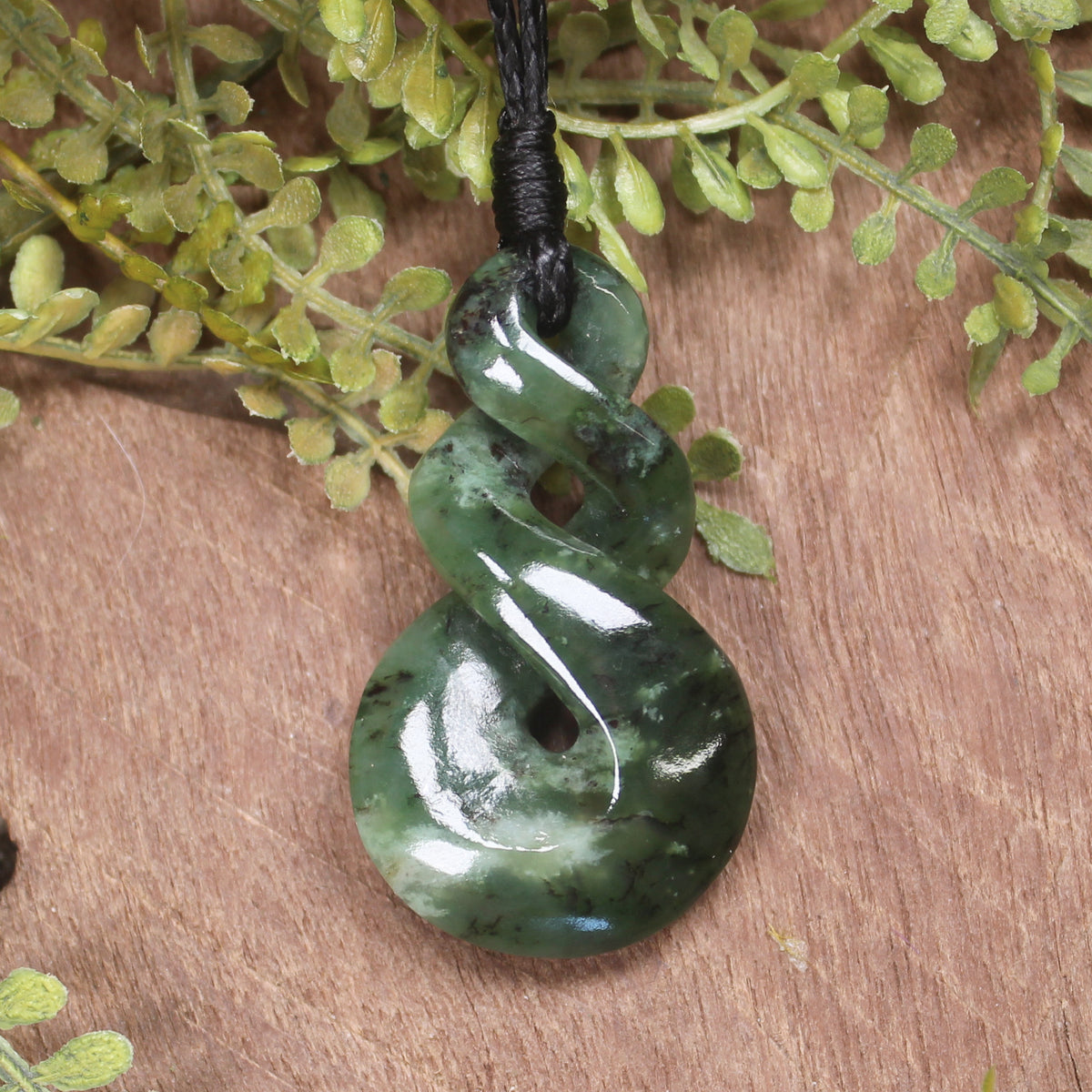 Twist or Pikorua carved from Hapopo Pounamu - NZ Greenstone