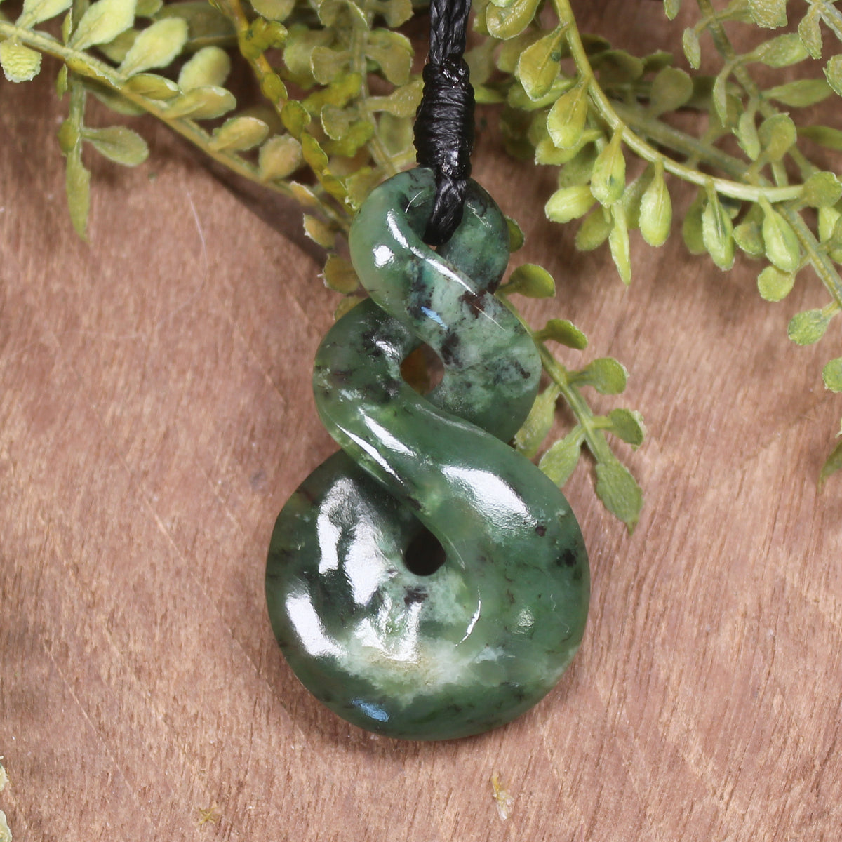 Twist or Pikorua carved from Hapopo Pounamu - NZ Greenstone