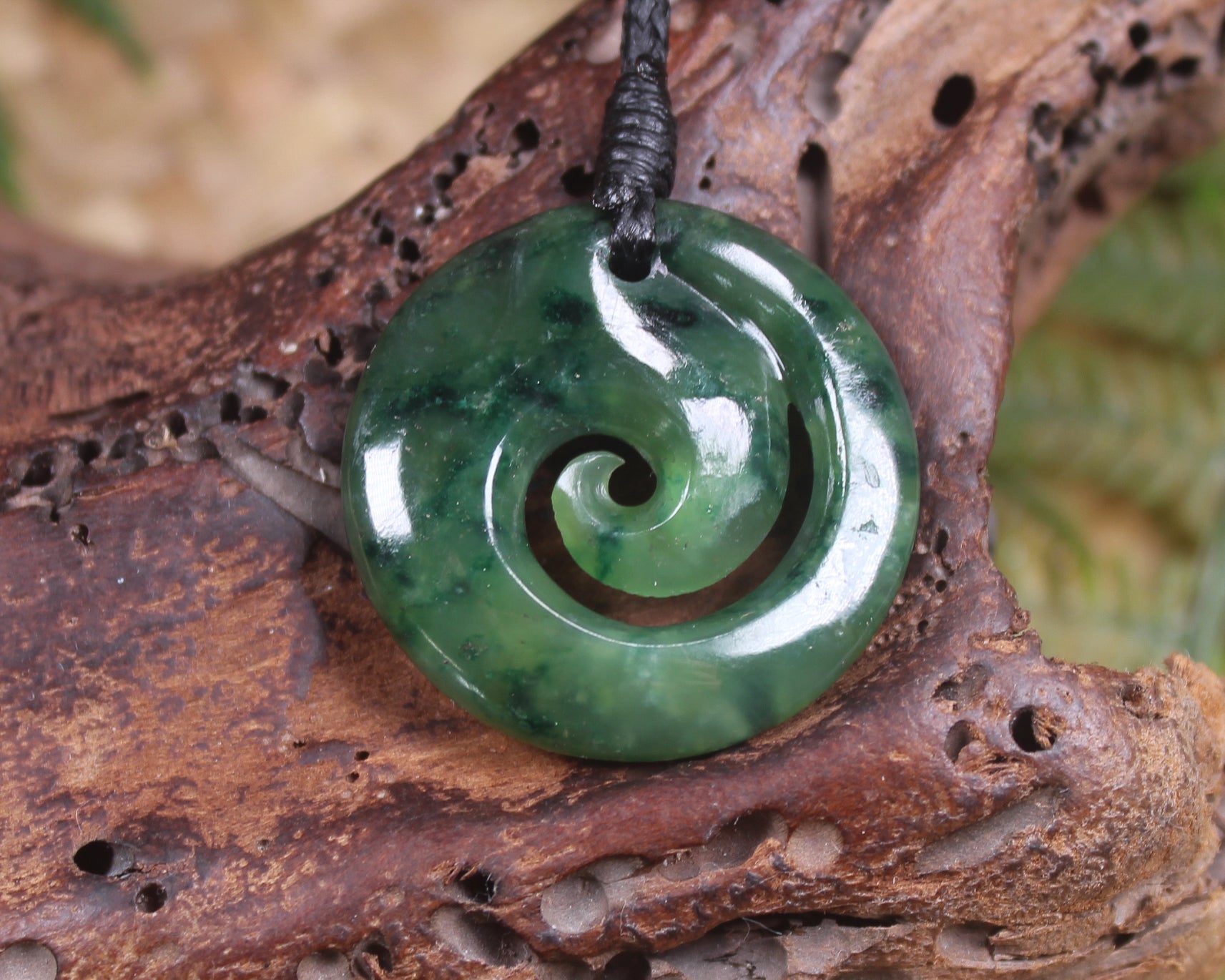 Koru pendant carved from Kawakawa Pounamu - NZ Greenstone