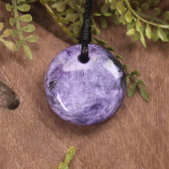 Porowhita carved from Russian Charoite