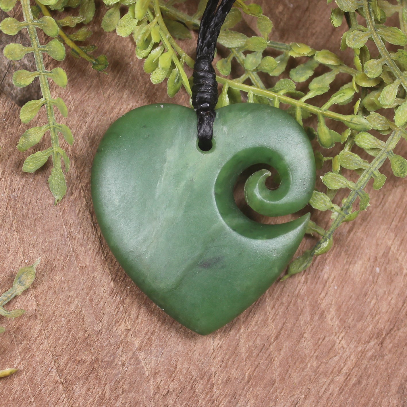 Heart with Koru carved from Hapopo Pounamu - NZ Greenstone