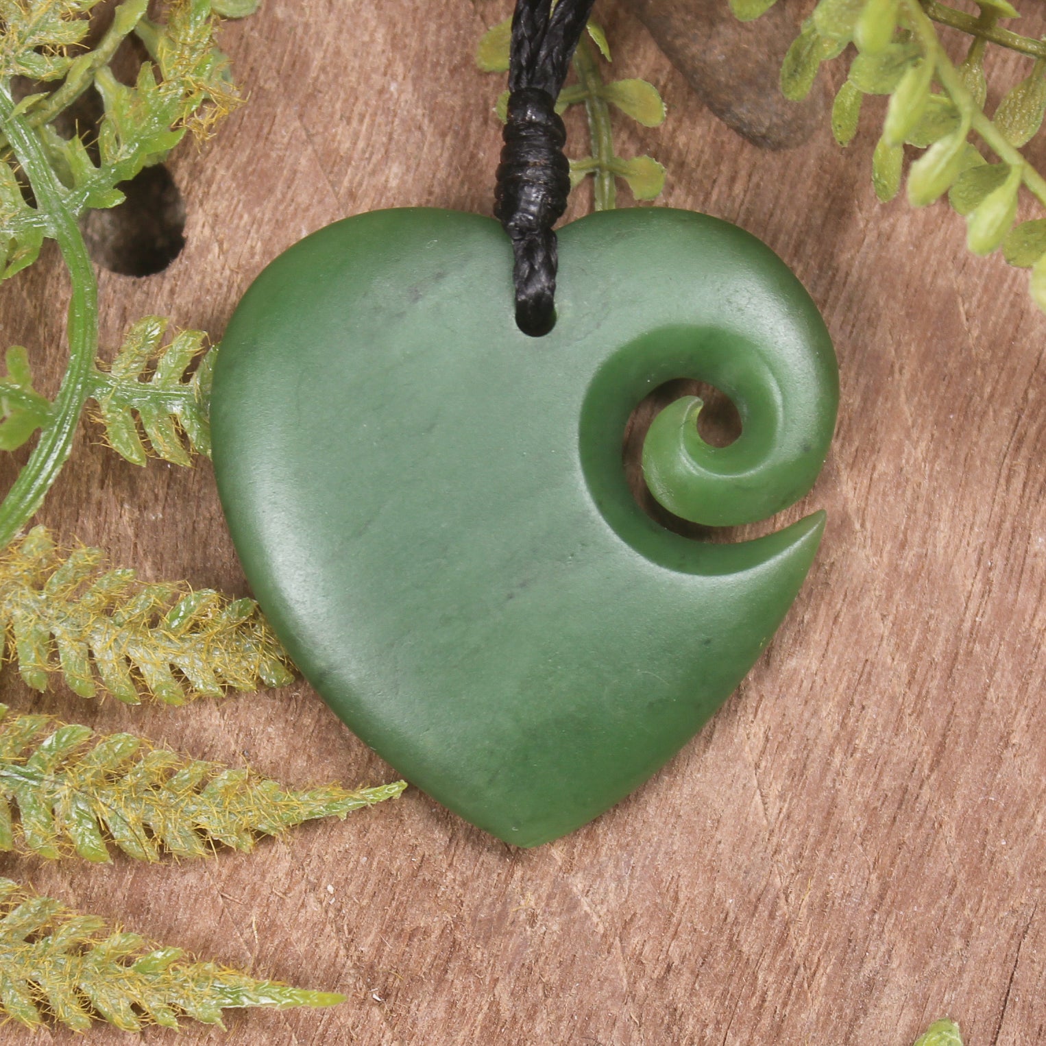 Heart with Koru carved from Hapopo Pounamu - NZ Greenstone