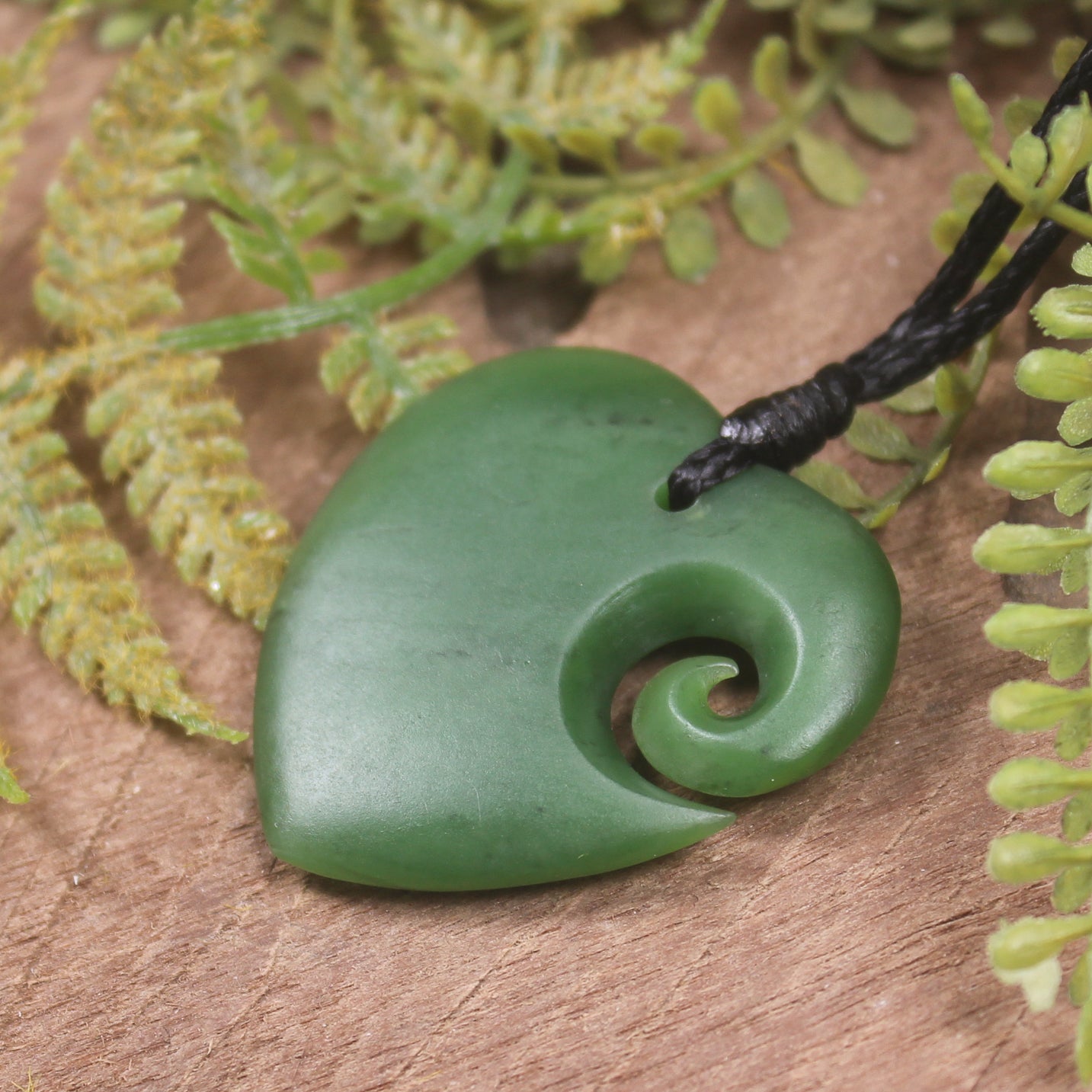 Heart with Koru carved from Hapopo Pounamu - NZ Greenstone