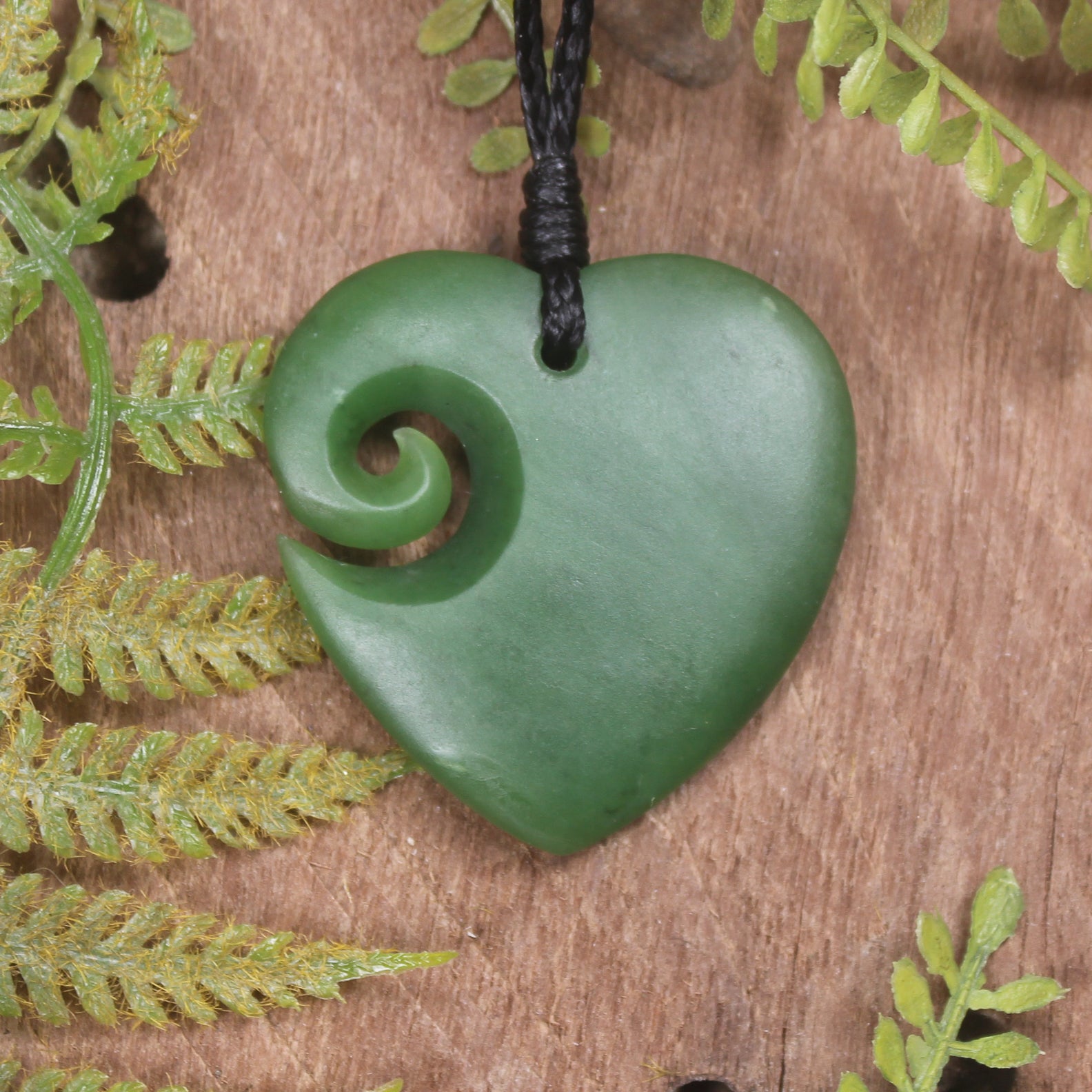 Heart with Koru carved from Hapopo Pounamu - NZ Greenstone