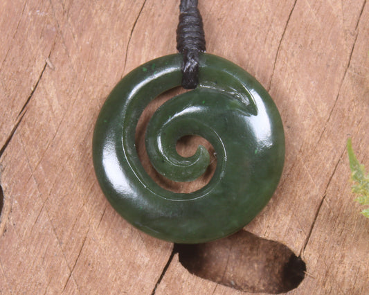 Koru pendant carved from Kawakawa Pounamu - NZ Greenstone