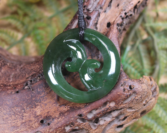 Koru pendant carved from Kawakawa Pounamu - NZ Greenstone