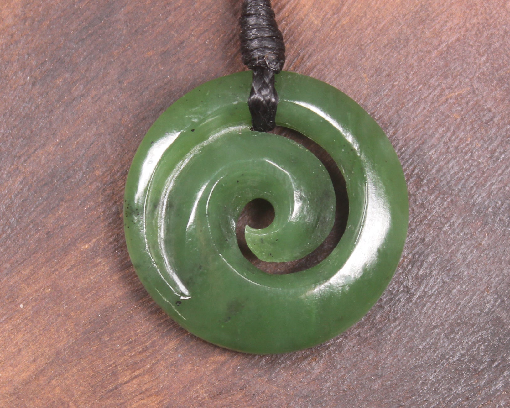 Koru carved from Hapopo Pounamu - NZ Greenstone