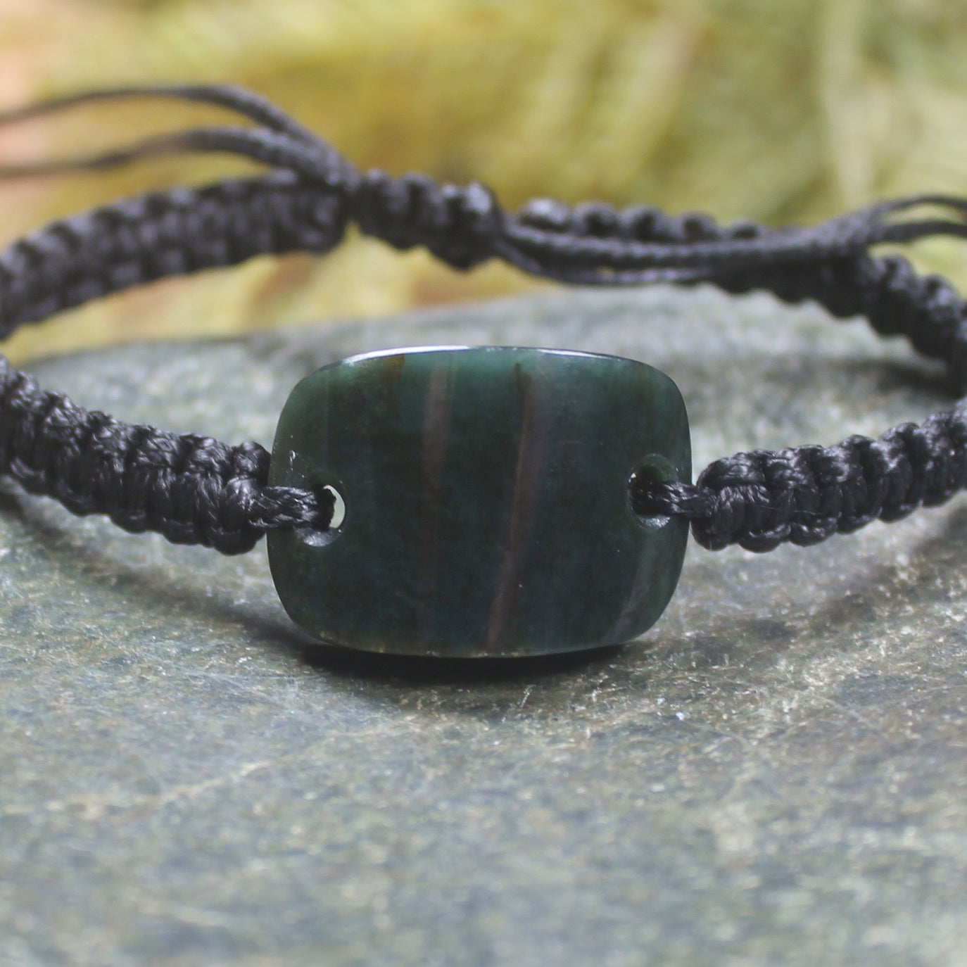 Adjustable cord bracelet with Kawakawa Pounamu