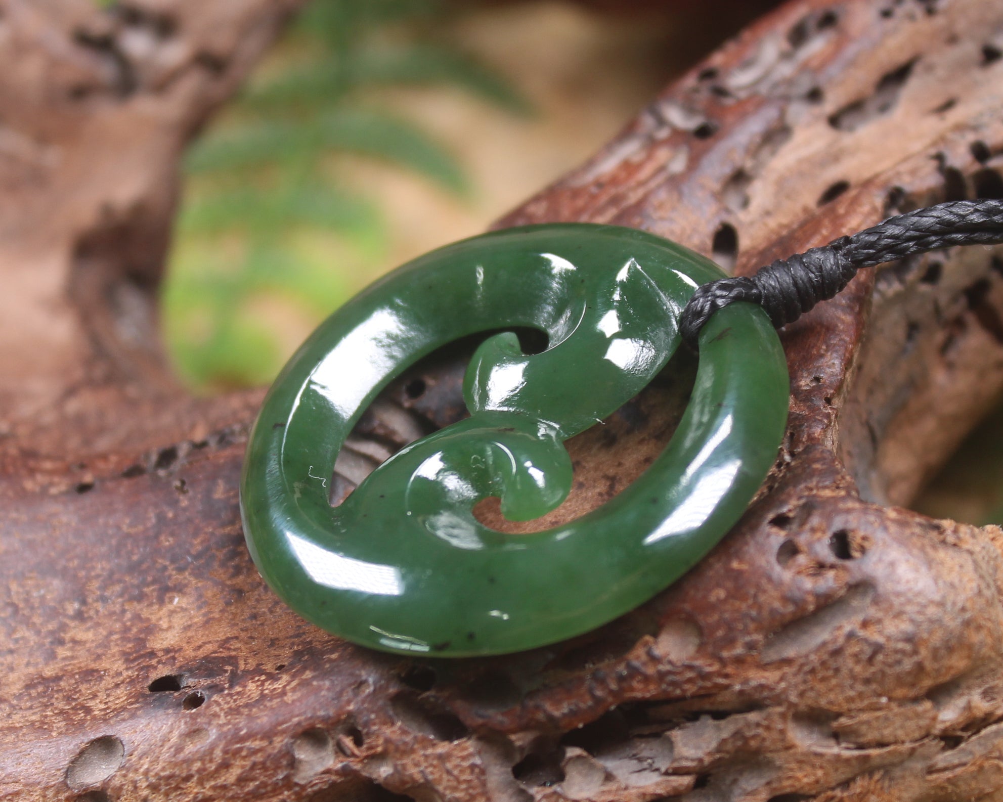Koru pendant carved from Kawakawa Pounamu - NZ Greenstone