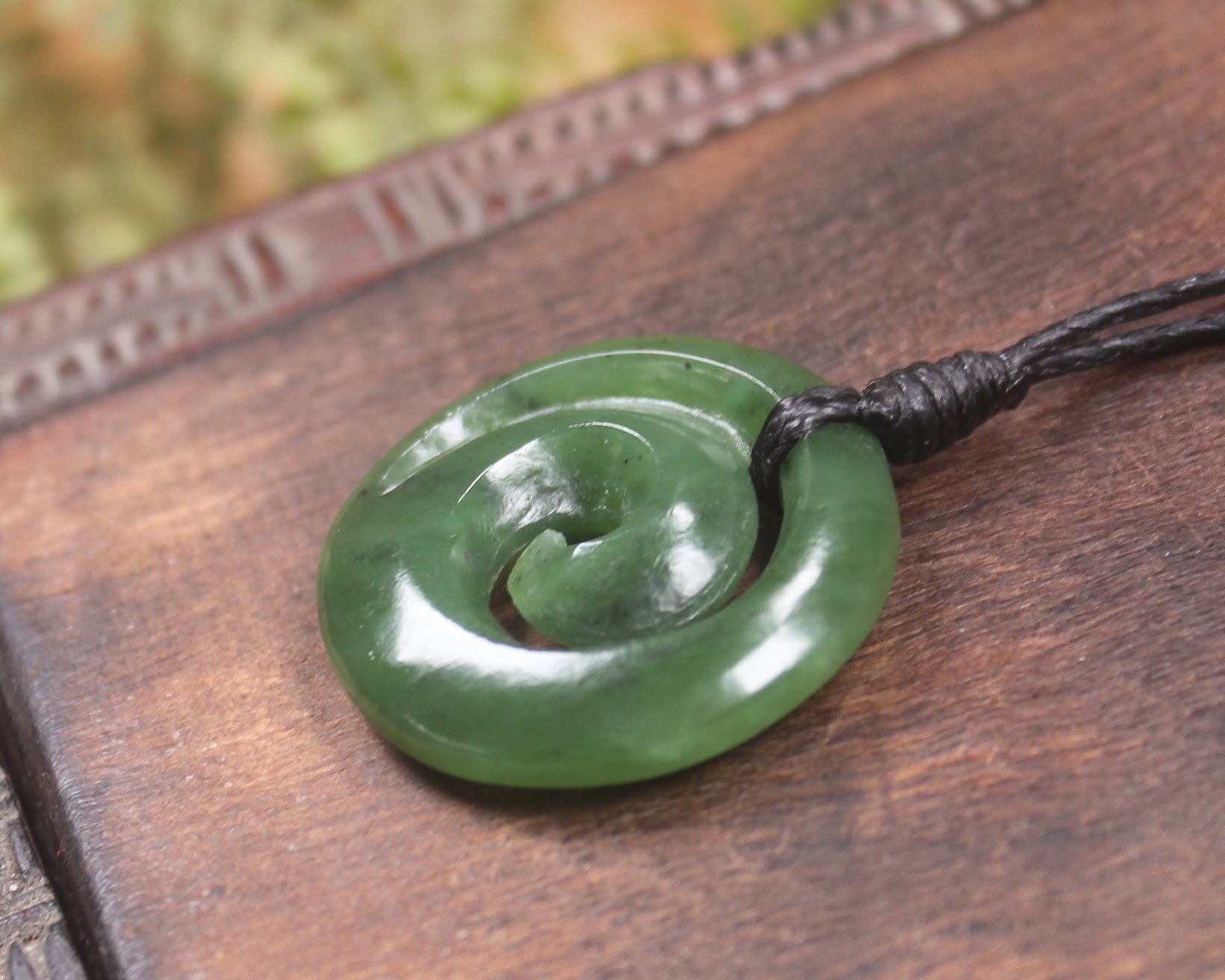 Koru carved from Hapopo Pounamu - NZ Greenstone