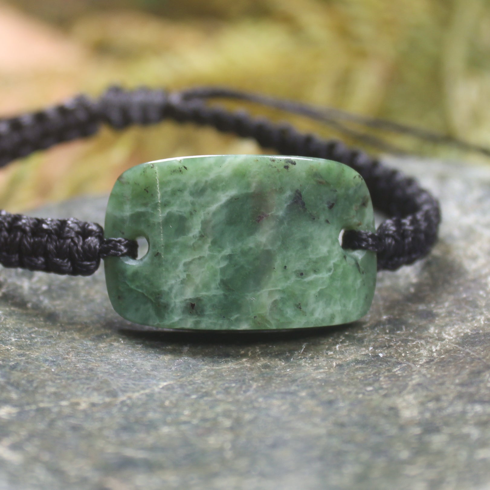 Adjustable cord bracelet with Kawakawa Pounamu