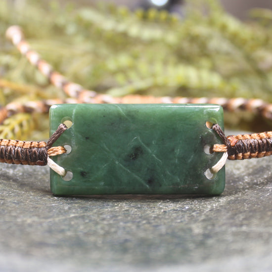 Adjustable cord bracelet with Hapopo Pounamu