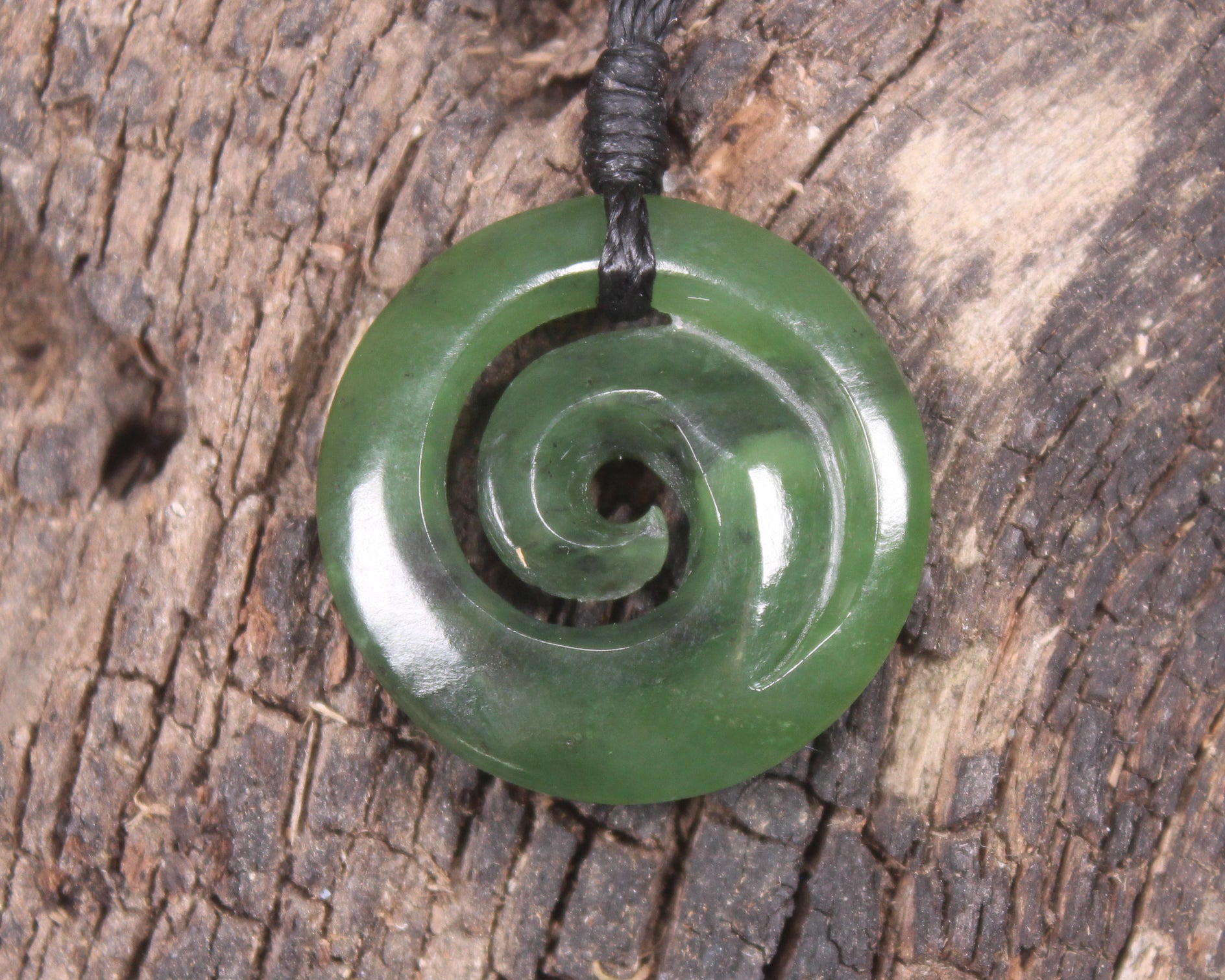 Koru carved from Hapopo Pounamu - NZ Greenstone