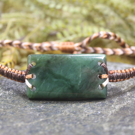 Adjustable cord bracelet with Hapopo Pounamu