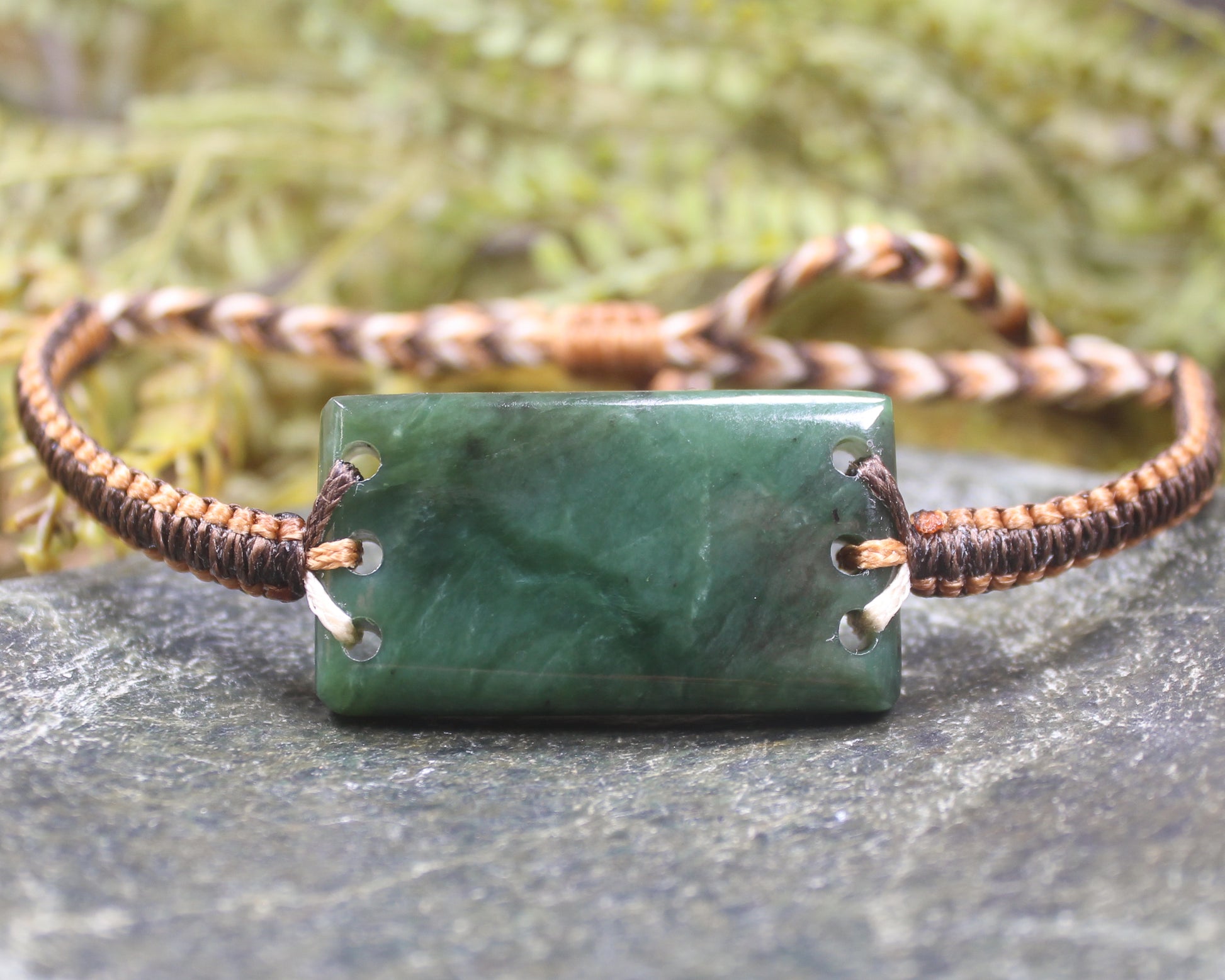 Adjustable cord bracelet with Hapopo Pounamu