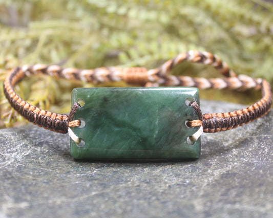 Adjustable cord bracelet with Hapopo Pounamu