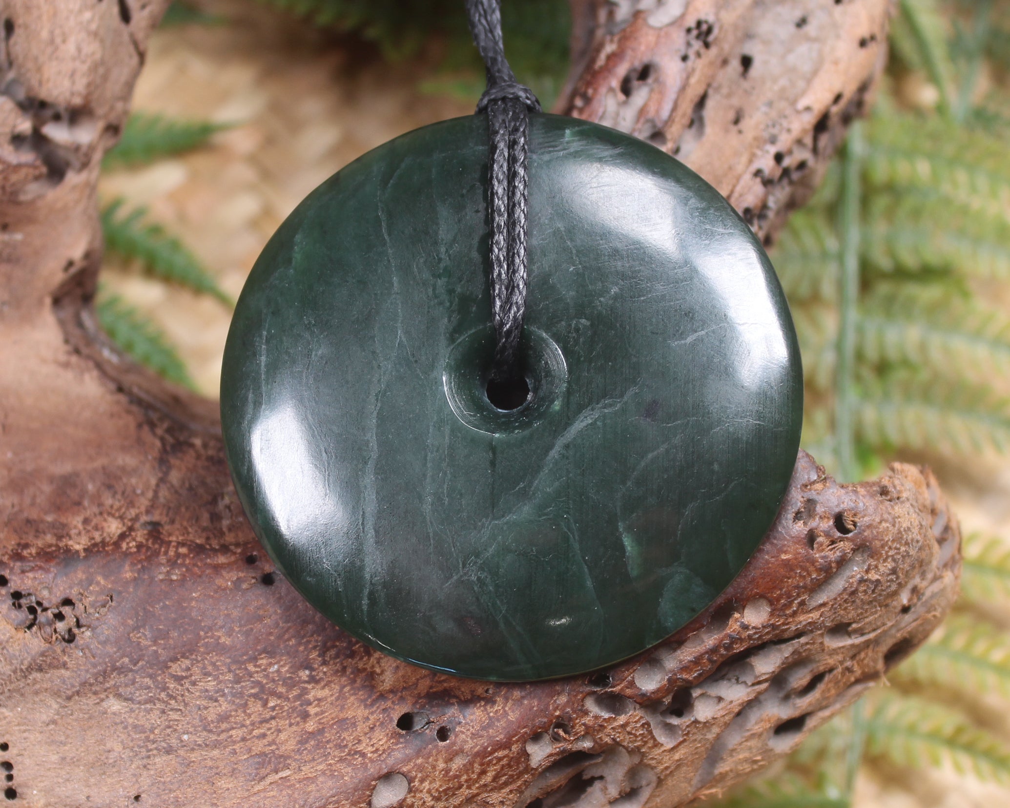 Porowhita or Pi Stone carved from Kawakawa Pounamu - NZ Greenstone