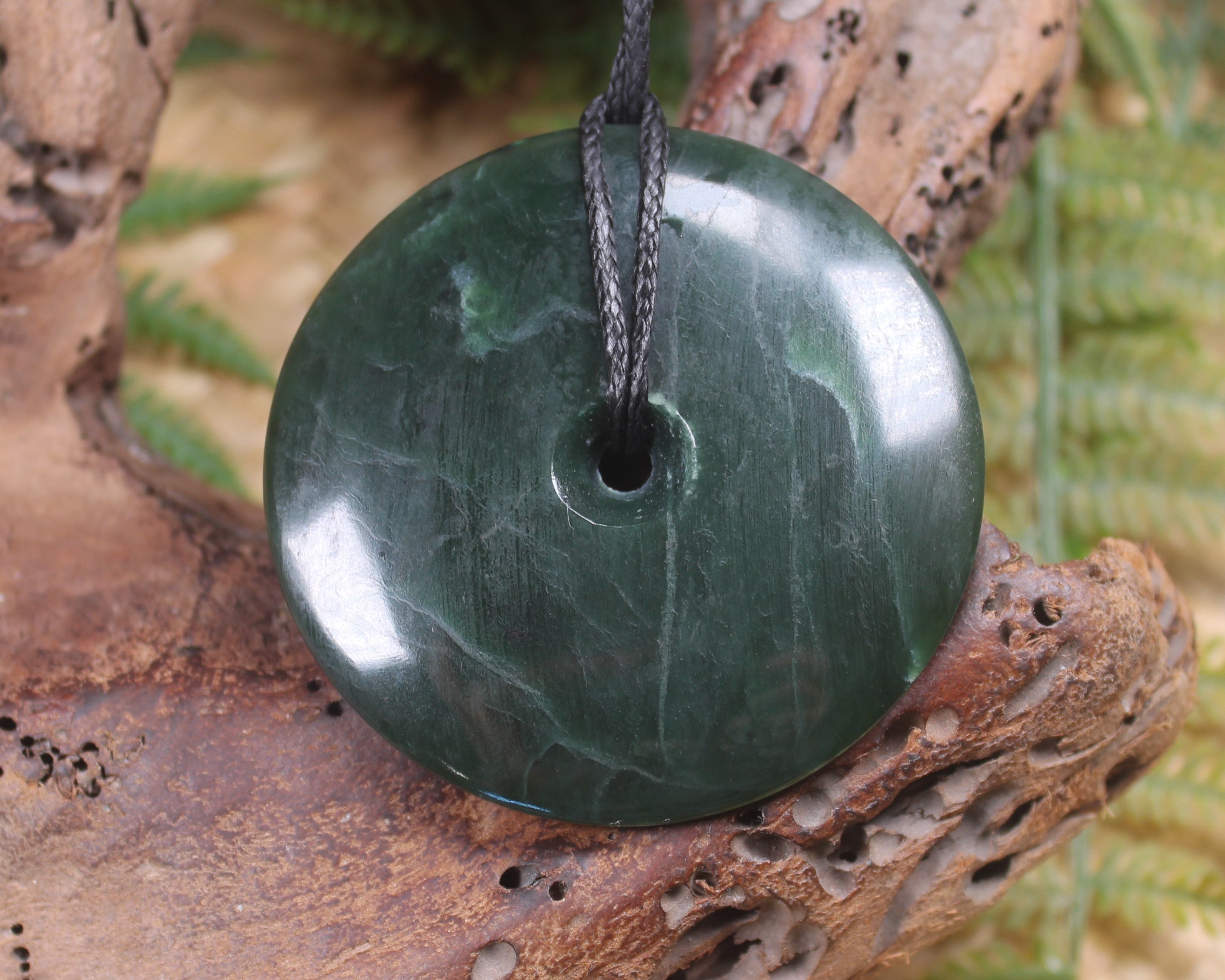 Porowhita or Pi Stone carved from Kawakawa Pounamu - NZ Greenstone