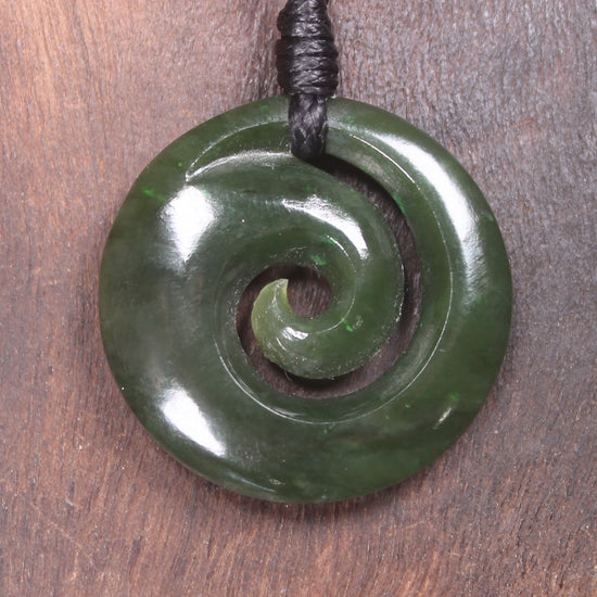 Koru pendant carved from Kawakawa Pounamu - NZ Greenstone