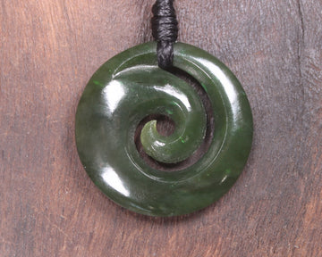 Koru pendant carved from Kawakawa Pounamu - NZ Greenstone