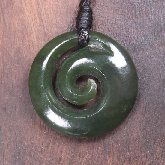 Koru pendant carved from Kawakawa Pounamu - NZ Greenstone
