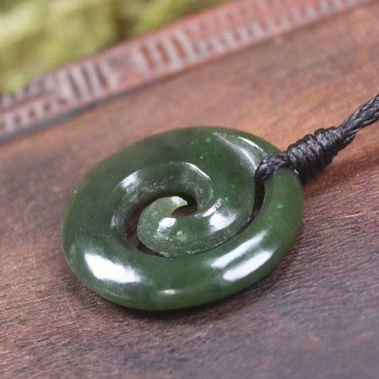 Koru pendant carved from Kawakawa Pounamu - NZ Greenstone