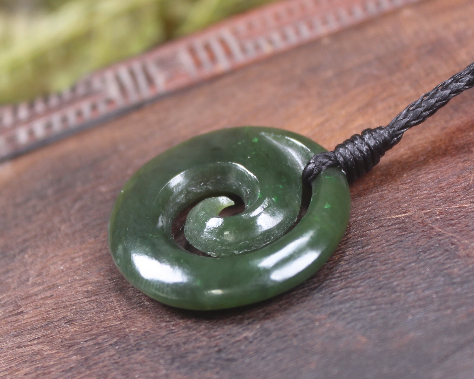 Koru pendant carved from Kawakawa Pounamu - NZ Greenstone