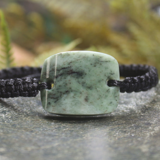 Adjustable cord bracelet with Hapopo Pounamu