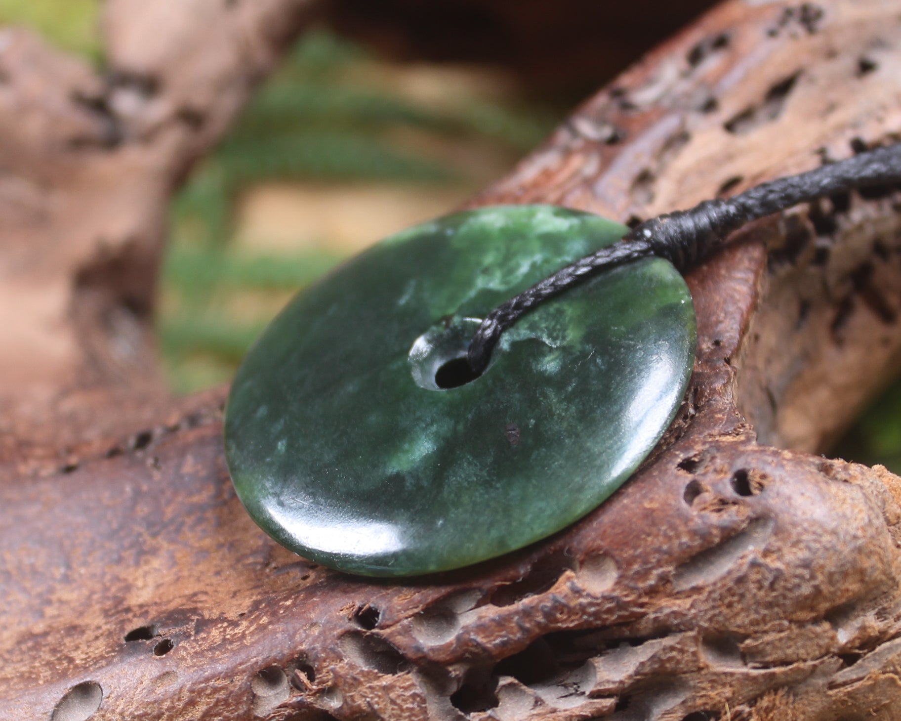 Porowhita or Pi Stone carved from Kawakawa Pounamu - NZ Greenstone