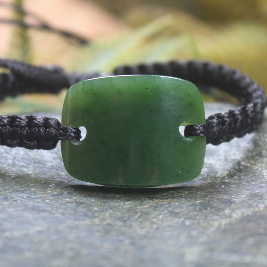 Adjustable cord bracelet with Kawakawa Pounamu