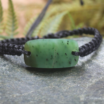 Adjustable cord bracelet with Hapopo Pounamu