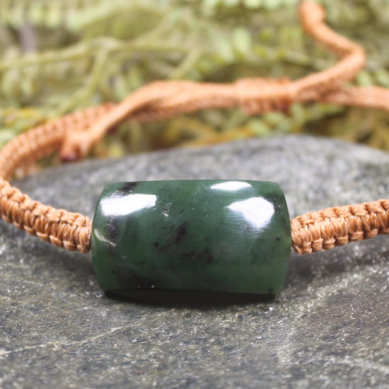 Adjustable cord bracelet with Hapopo Pounamu