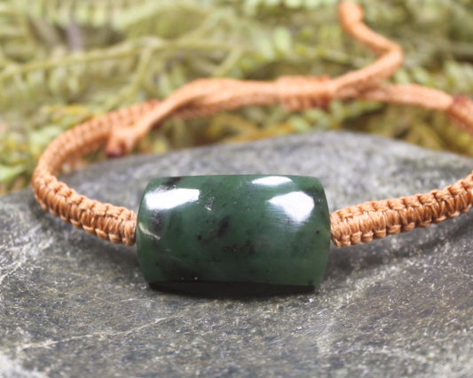 Adjustable cord bracelet with Hapopo Pounamu