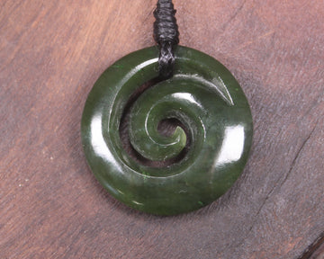 Koru pendant carved from Kawakawa Pounamu - NZ Greenstone
