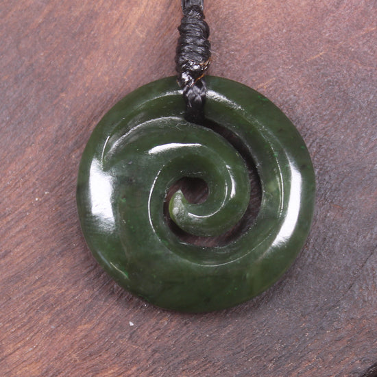 Koru pendant carved from Kawakawa Pounamu - NZ Greenstone