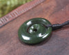 Koru pendant carved from Kawakawa Pounamu - NZ Greenstone