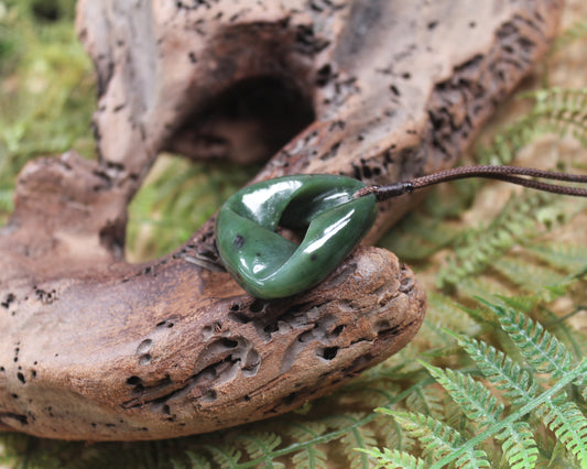 Mobius Ribbon Pendant carved from Hapopo Pounamu - NZ Greenstone
