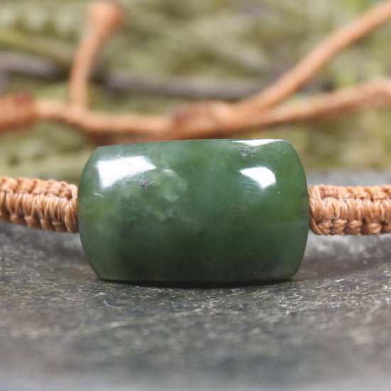 Adjustable cord bracelet with Hapopo Pounamu
