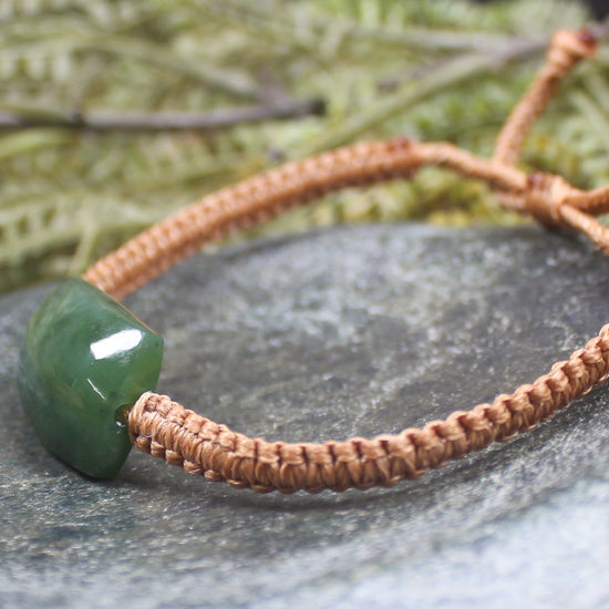 Adjustable cord bracelet with Hapopo Pounamu