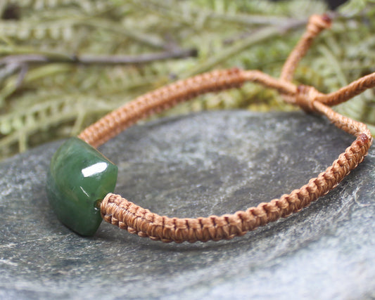 Adjustable cord bracelet with Hapopo Pounamu