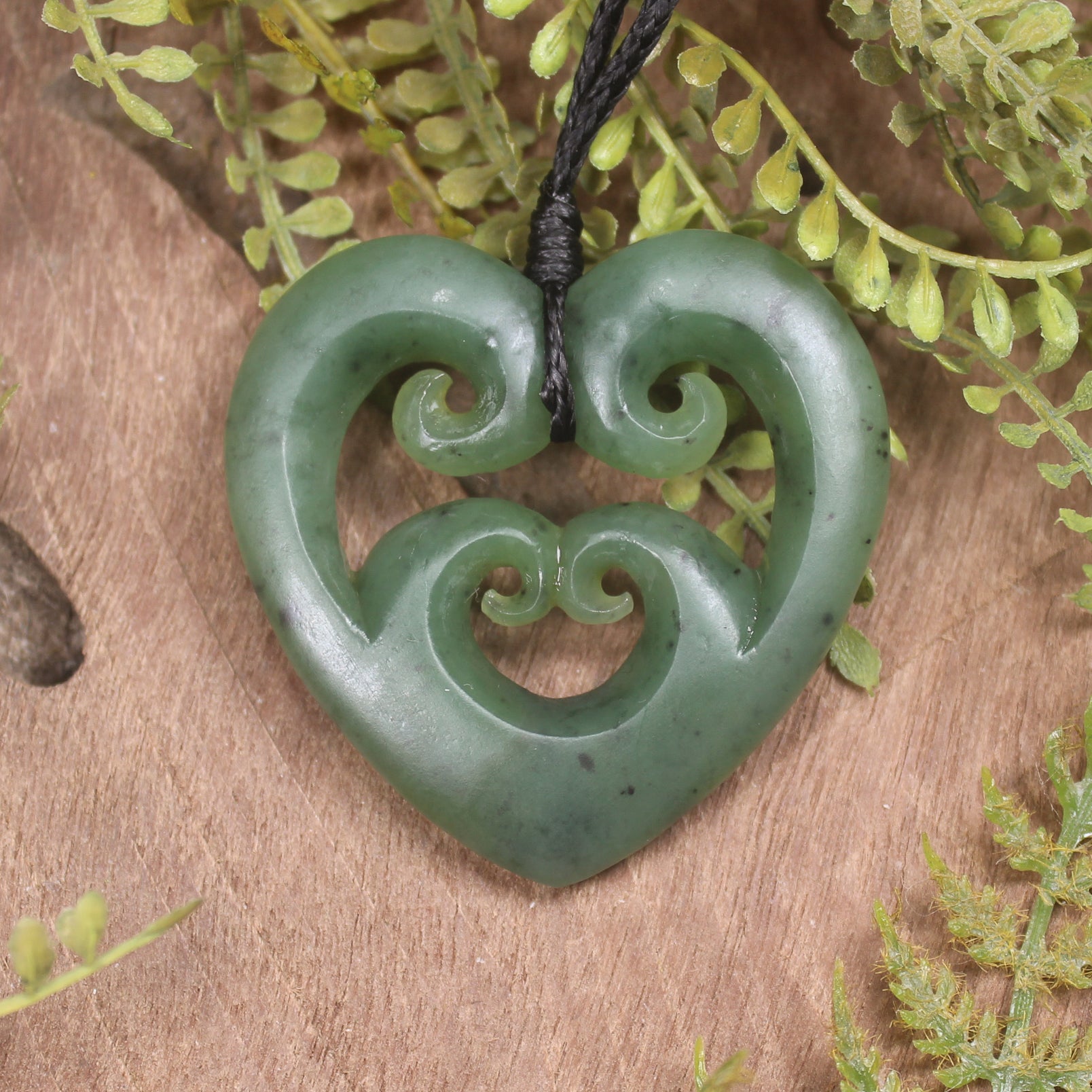 Heart with Koru carved from Hapopo Pounamu - NZ Greenstone