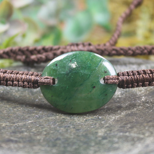 Adjustable cord bracelet with Kawakawa Pounamu