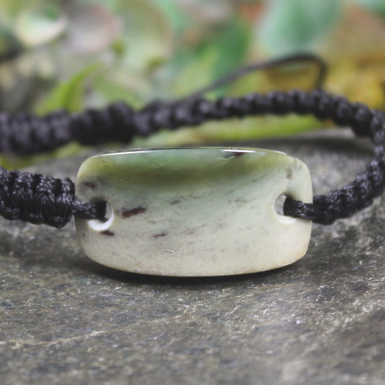 Adjustable cord bracelet with Hapopo Pounamu