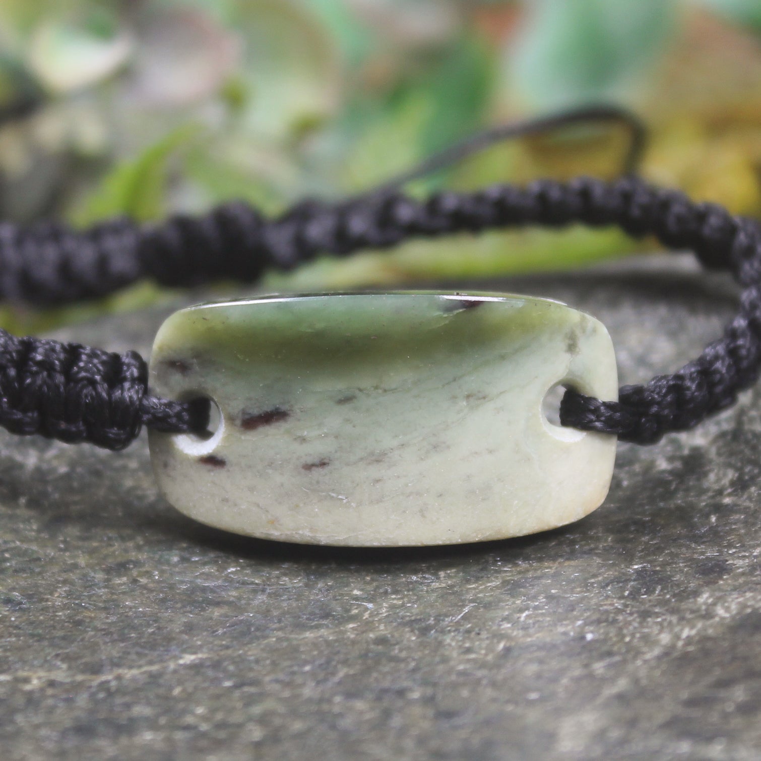 Adjustable cord bracelet with Hapopo Pounamu