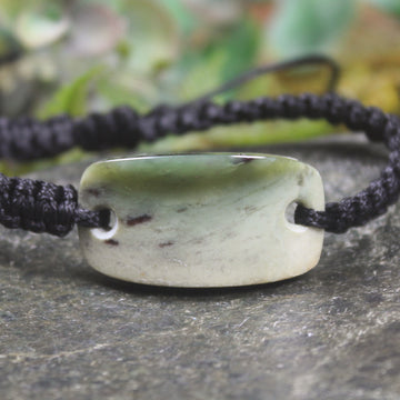 Adjustable cord bracelet with Hapopo Pounamu