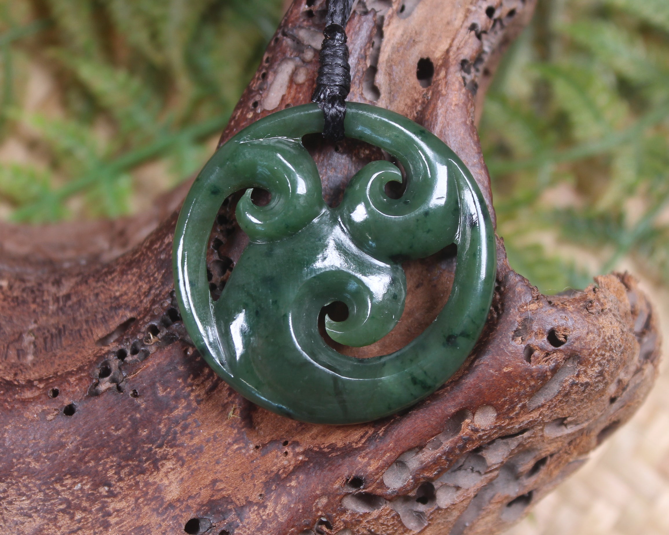 Koru pendant carved from Kawakawa Pounamu - NZ Greenstone