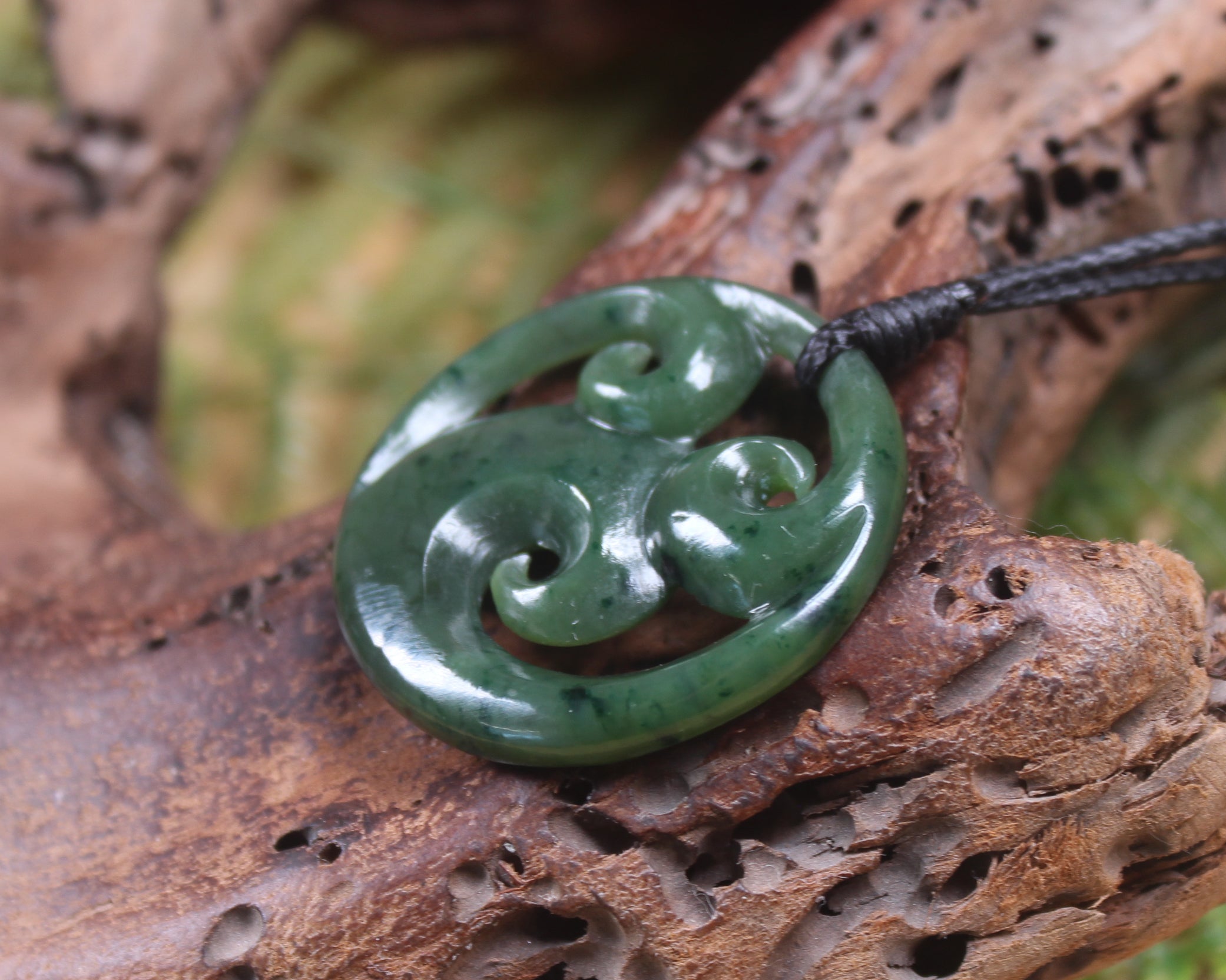 Koru pendant carved from Kawakawa Pounamu - NZ Greenstone