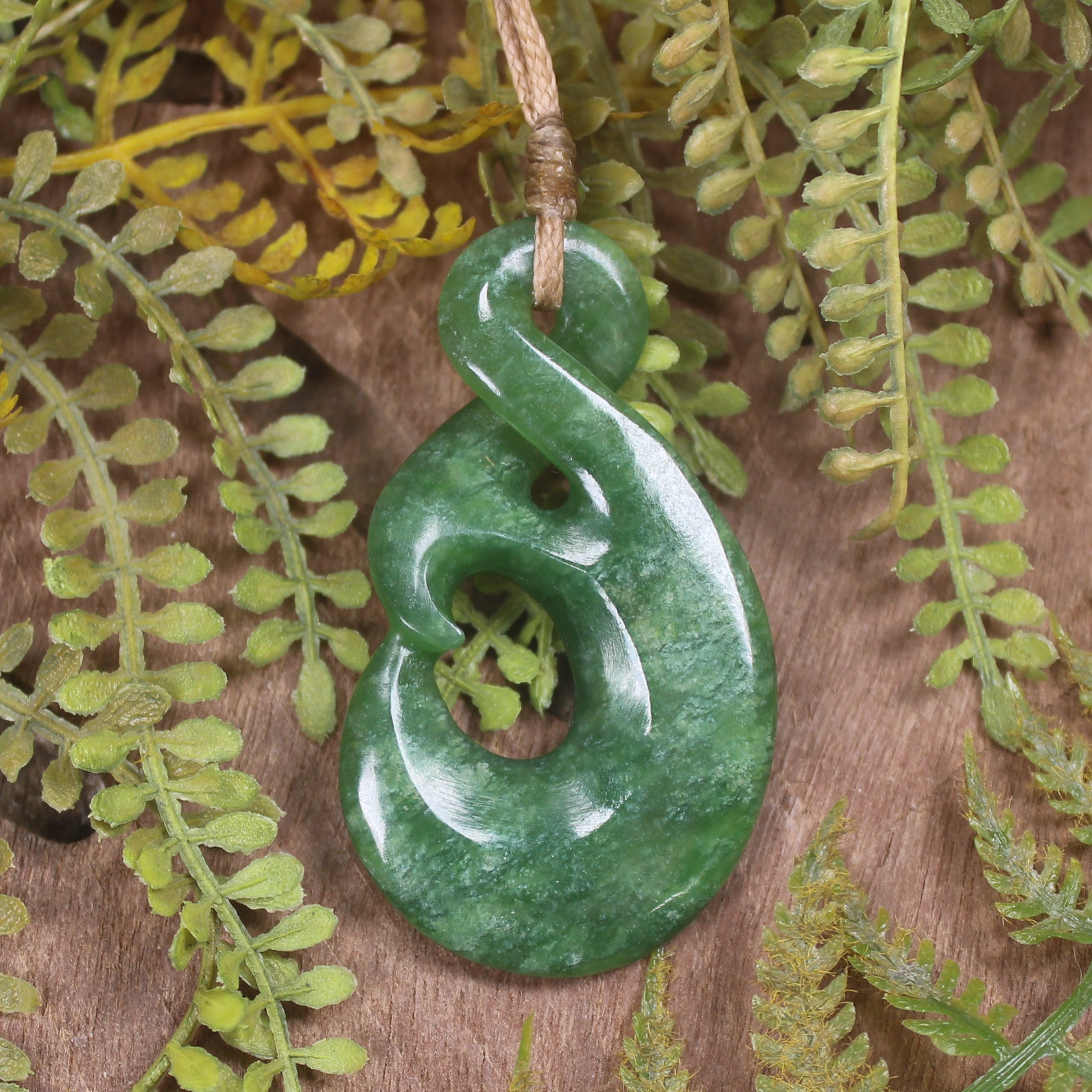 Koru Twist carved from Kawakawa Pounamu - NZ Greenstone