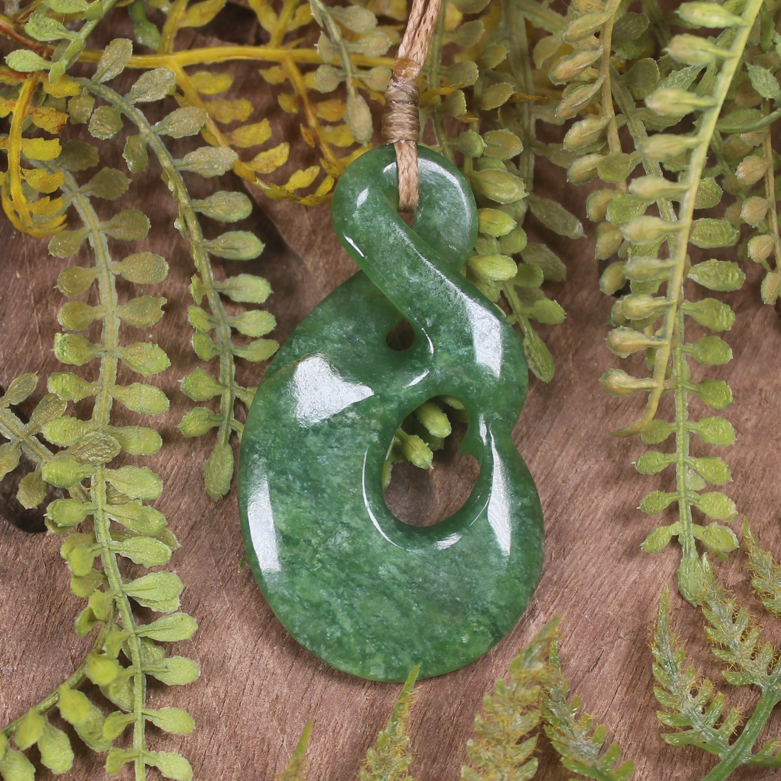 Koru Twist carved from Kawakawa Pounamu - NZ Greenstone