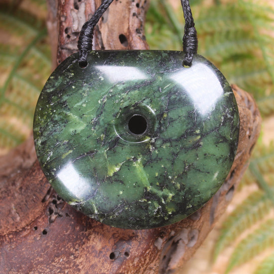 Porowhita carved from Douglas Creek Pounamu - NZ Greenstone